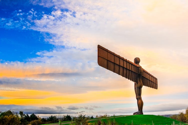 Photo of angel of the north a steel sculpture stand alone on morning day at Newcastle Upon Tyne, UK.