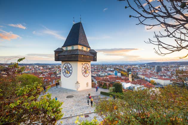 Photo of The famous clock tower on Schlossberg hill, in Graz, Styria region, Austria.