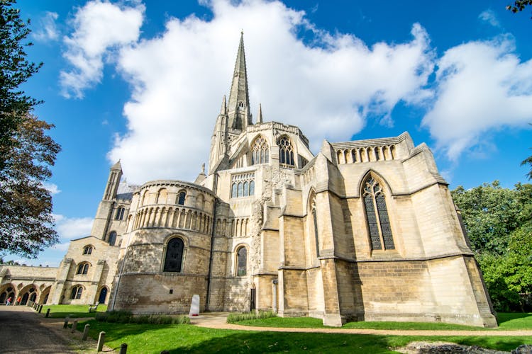Photo of most famous place in Norwich, The Norwich Cathedral on a sunny day at Nowich, Norfolk, England.