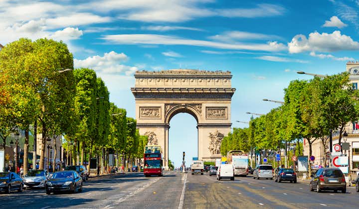Photo of road of Champs Elysee leading to Arc de Triomphe in Paris, France.