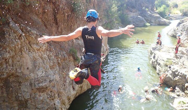 From Mijas: Guadalmina Canyon Canyoning Tour