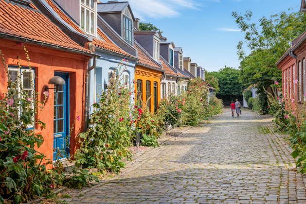 Colourful old cottages on a quiet street in Aarhus, Denmark.