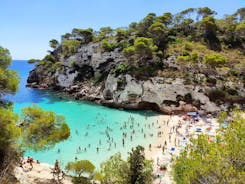 Photo of Cala Macarelleta in Ciutadella Menorca at turquoise Balearic Islands, Spain.