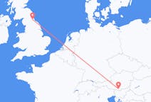 Fly fra Klagenfurt til Durham, England