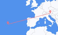 Fly fra São Jorge Island til Klagenfurt