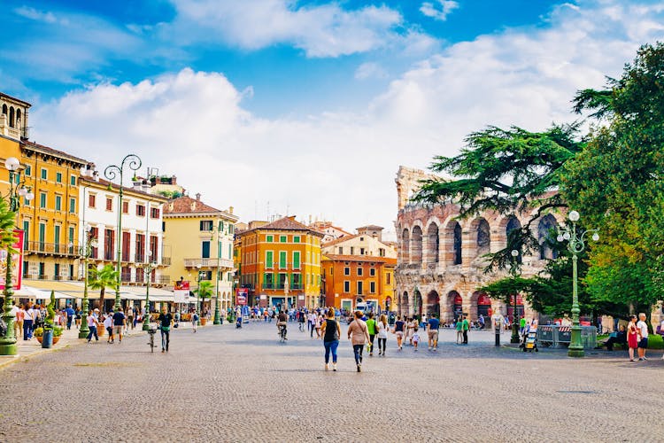 Photo of Cityscape of Verona with Piazza Bra and Verona Arena on a sunny day in Verona, Italy.