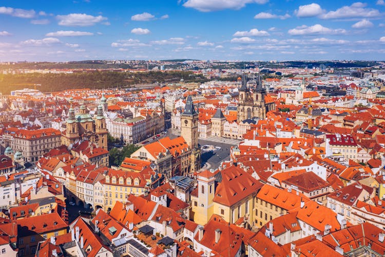 Photo of Prague beautiful panoramic sunny aerial drone view above Prague Old Town.