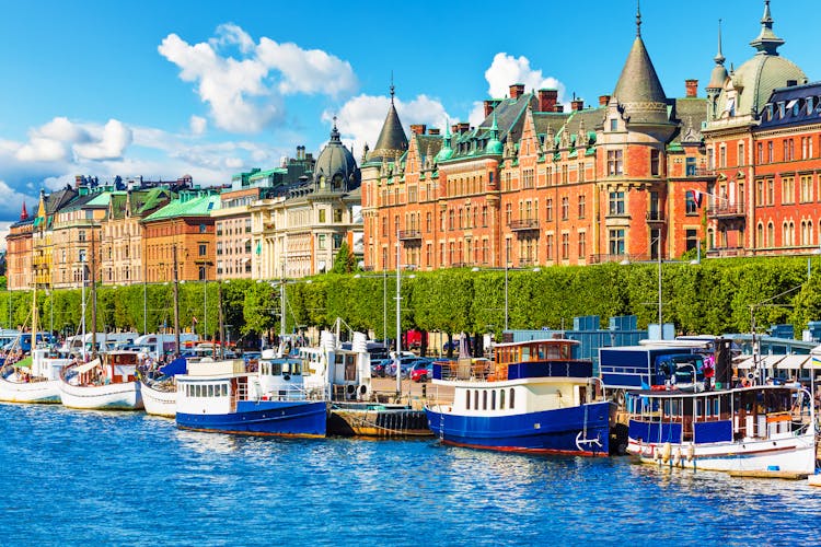 Scenic summer panorama of the Old Town (Gamla Stan) pier architecture in Stockholm, Sweden.