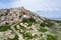 Photo of aerial view of Agioi Saranta cave church built in mountain in Protaras, Cyprus.