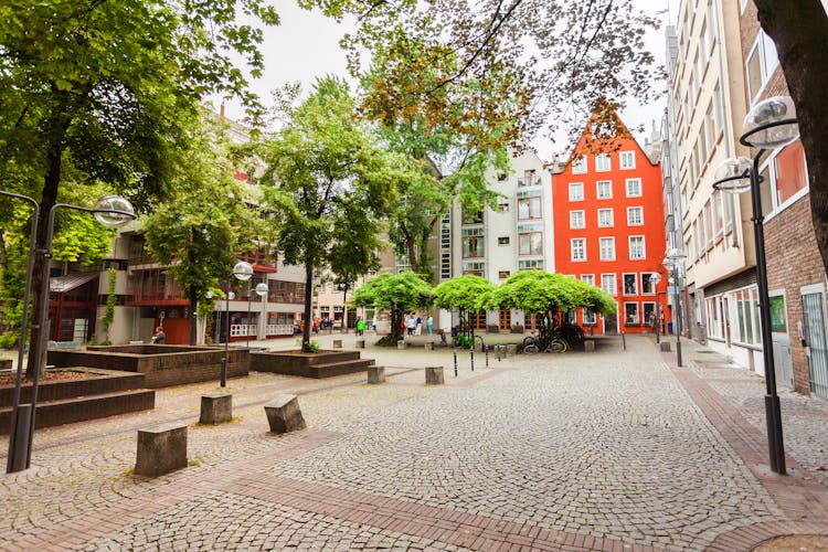 Photo of the cozy patio with green in the center of Cologne, Germany. 