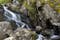 photo of view of A waterfall along the Boyana River in Vitosha Mo,Sofia bulgaria.untain in Bulgaria. Natural scene with water and rocks. Explore Bulgarian waterfalls concept. Beautiful landscape.,