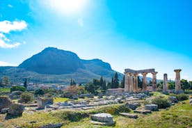 Photo of temple of Apollo with Acrocorinth in the background. Ancient Corinth, Greece.