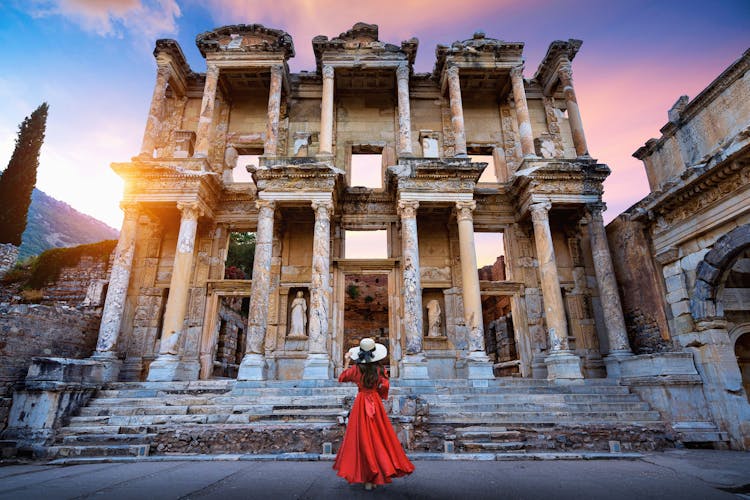 Photo of Woman standing in Celsus Library at Ephesus ancient city in Izmir.