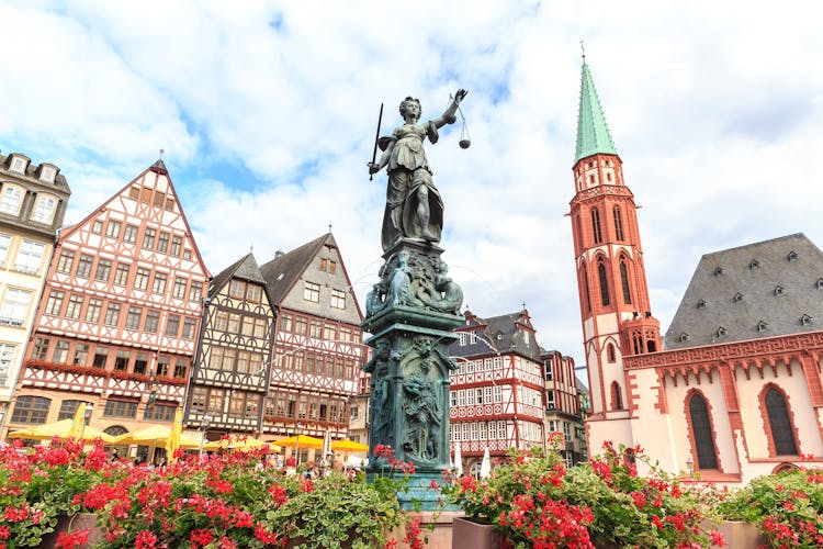 Photo of old town square romerberg with Justitia statue in Frankfurt ,Germany.
