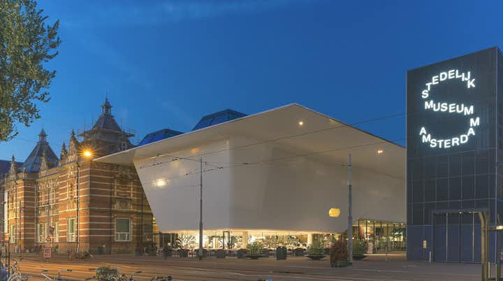 photo of Stedelijk Museum Amsterdam at night in the Netherlands.