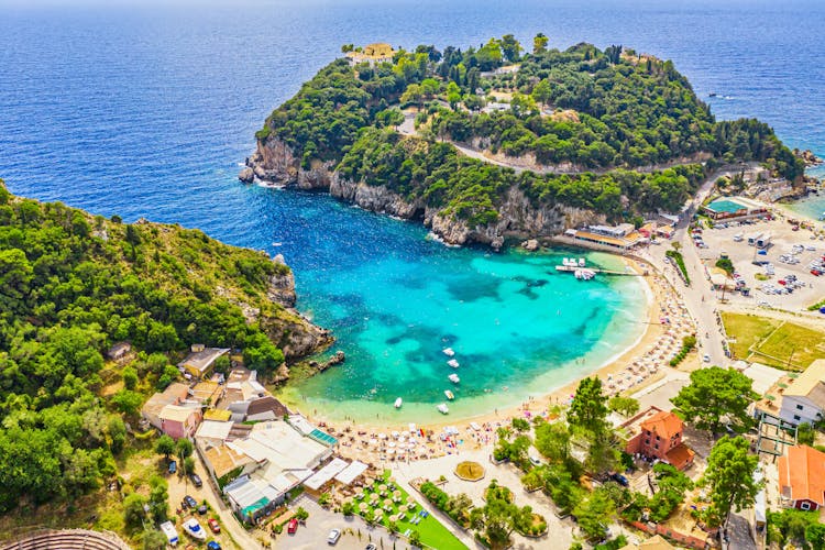Photo of aerial drone view of famous Paleokastritsa beach resort on Corfu island, Greece.